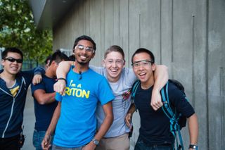 Members of UCSD's student rocket team celebrate progress with their 3D printed rocket engine. From left: Vincent Tran, Jia Yang, Deepak Atyam, Jesse Lang, Jeffrey Chan.