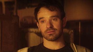 Matt looking at a painting on the wall.