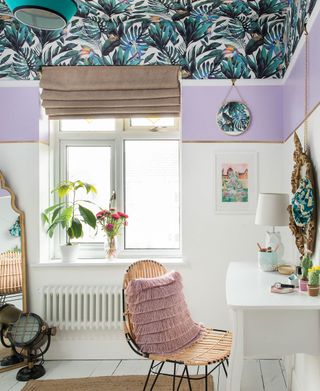 home office with wallpapered ceiling