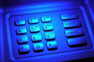 Cover one hand with the other while using ATMs