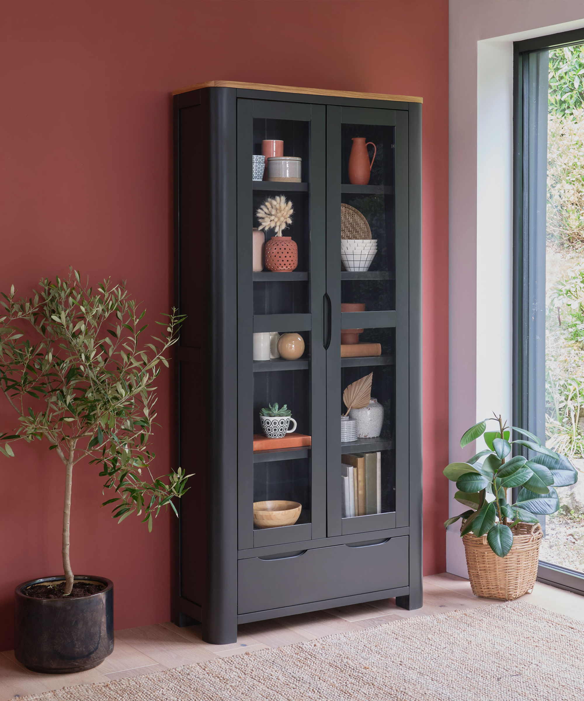 Display cabinet with dark grey paint finish and natural oak top