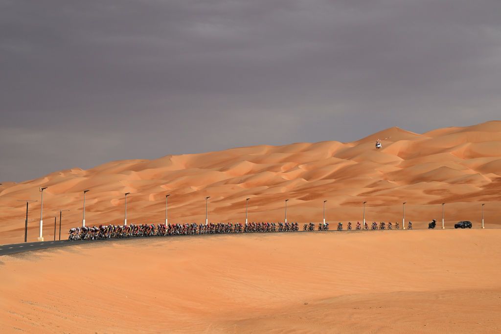 LIWA PALACE ABU DHABI UNITED ARAB EMIRATES FEBRUARY 17 A general view of the peloton competing during the to the 7th UAE Tour Stage 1 a 138km stage from Madinat Zayed Shams Solar Park to Liwa Palace UCIWWT on February 17 2025 in Liwa Palace Abu Dhabi United Arab Emirates Photo by Dario BelingheriGetty Images