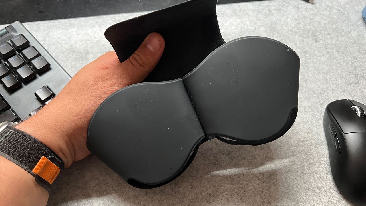 Apple AirPods Max headphones in their case