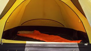 A sleeping pad inside a tent