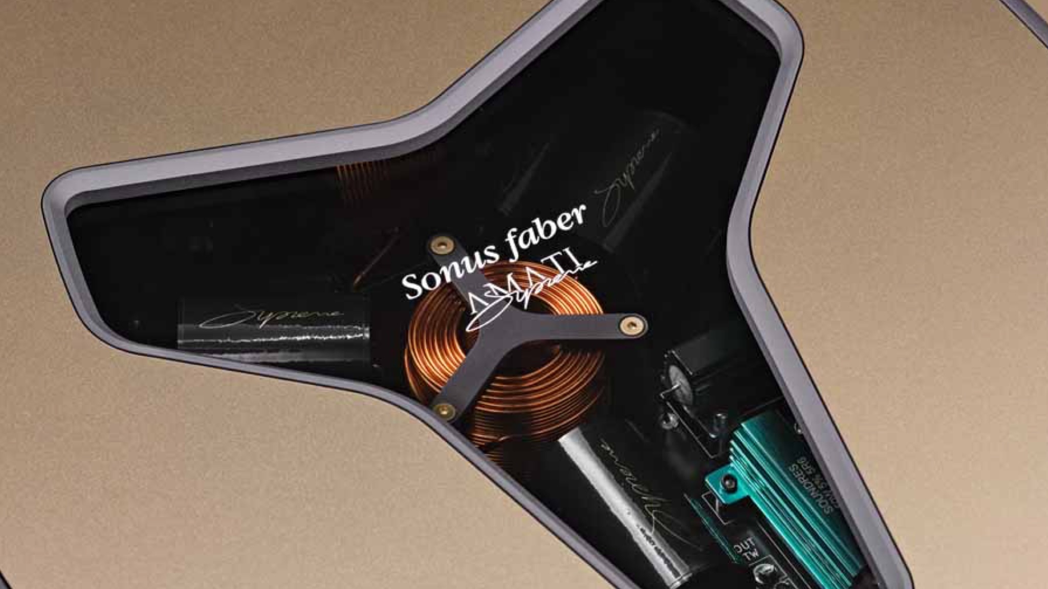 Close-up of the Y-shaped window on top of a Sonos Faber Amati Supreme speaker showing the crossovers inside