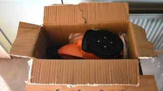 Orange VonHaus orbital sander in box