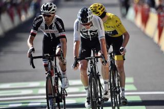 Chris Froome, Tom Dumoulin and Geraint Thomas finish stage 14 at the Tour de France