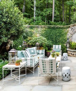 outdoor living room patio with plants