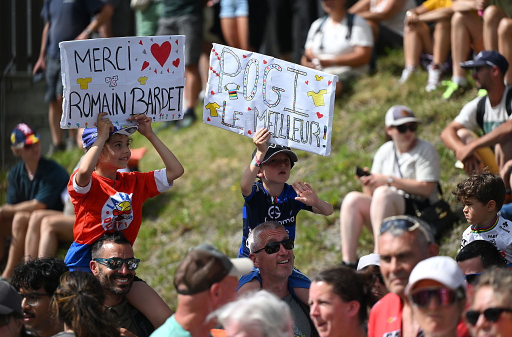 VALMEINIER 1800, FRANCE - JUNE 14: Fans of Romain Bardet of France and Team Picnic PostNL after the 77th Criterium du Dauphine 2025, Stage 7 a 131.6km stage from Grand-Algueblanche to Valmeinier 1800 (1830m) / #UCIWT / on June 14, 2025 in Valmeinier 1800, France.