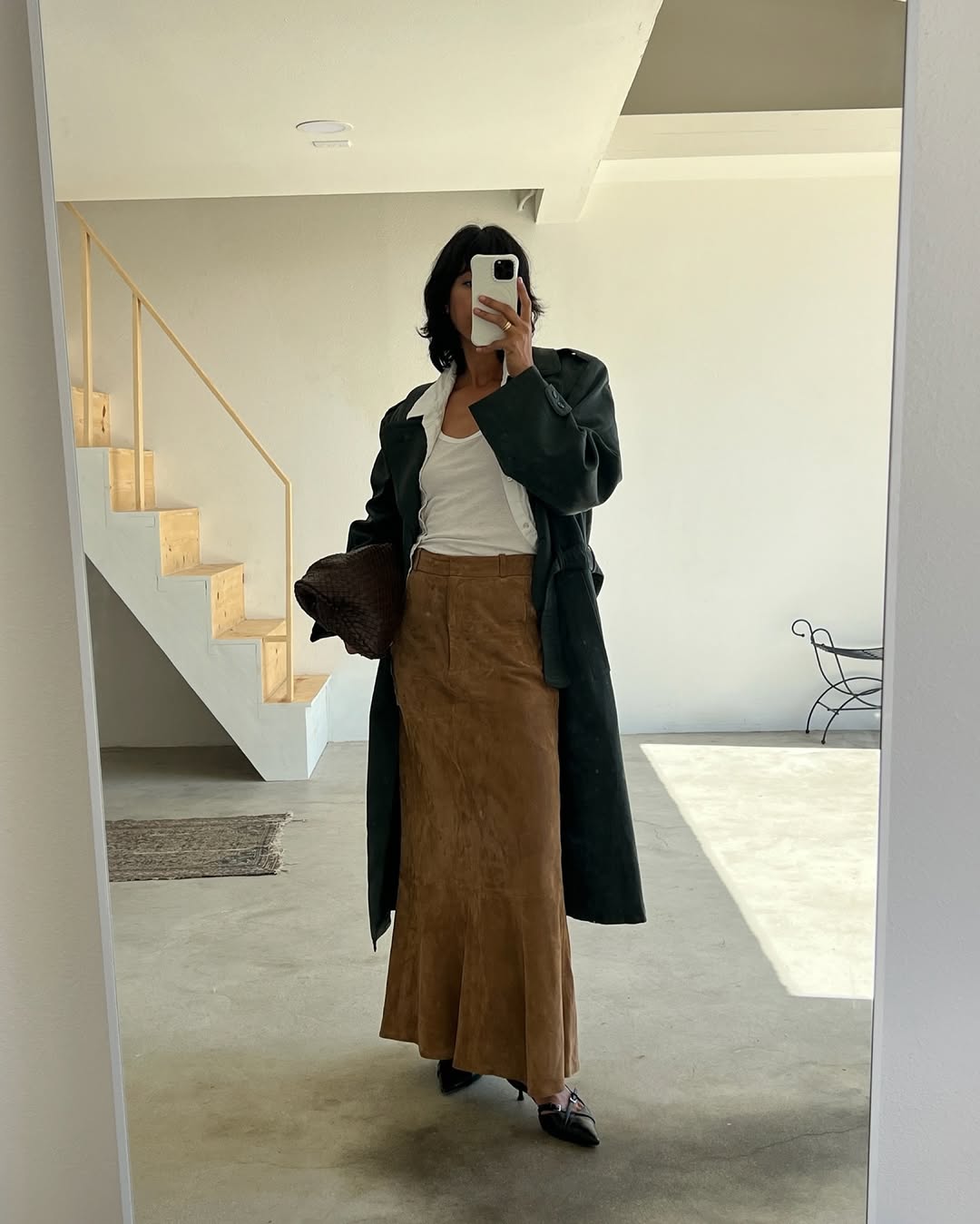 woman wearing fall skirt outfit 2025