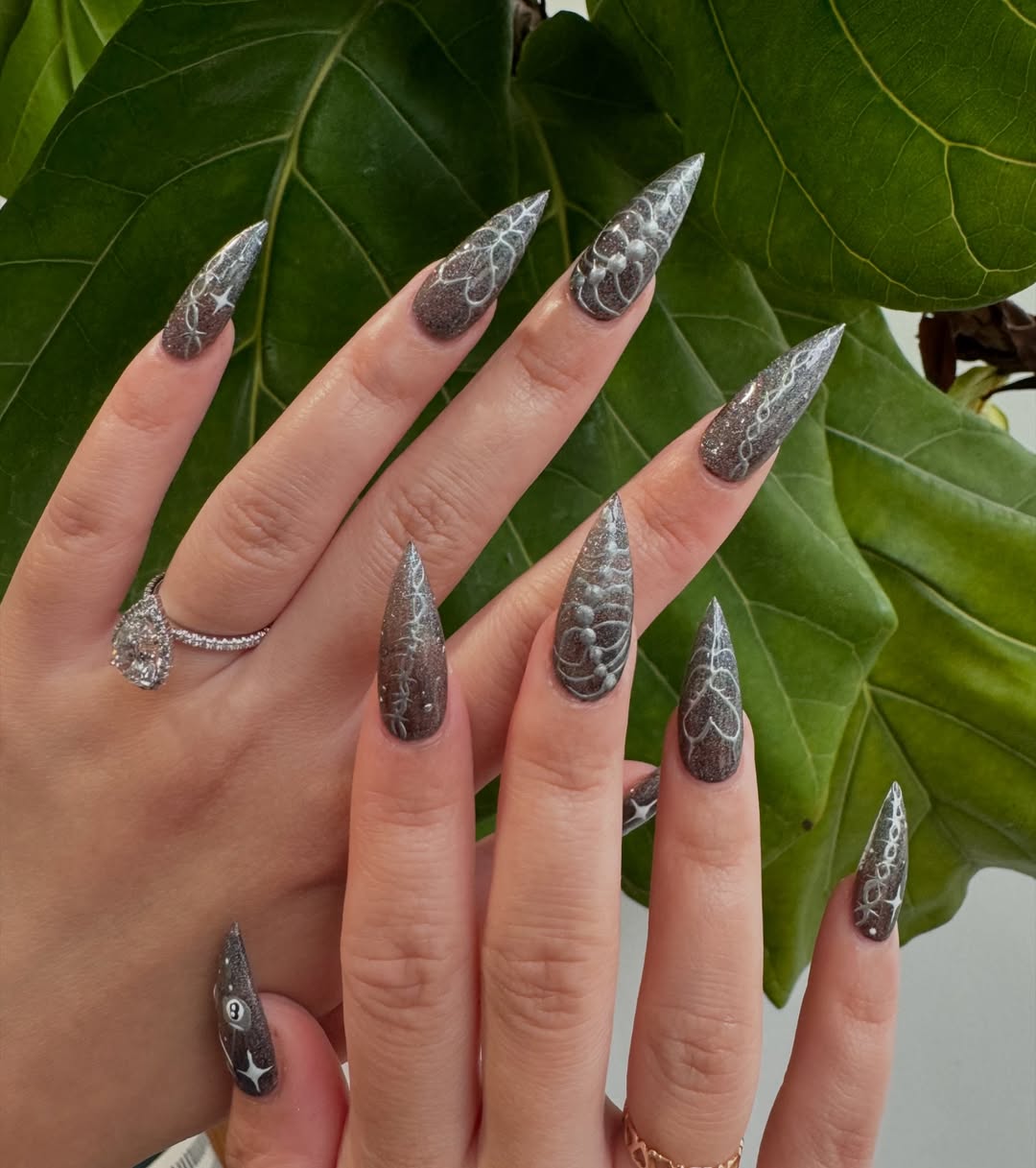 chrome skeleton halloween manicure