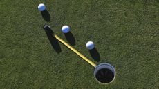 Image of a short putt being attempted by a golfer