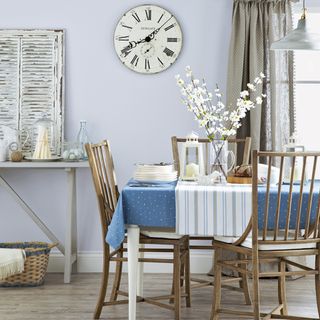 dining room with blue coloured and dining table