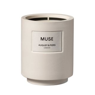 a product shot of an August & Piers muse candle