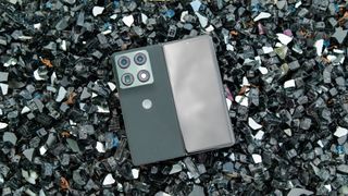 The Motorola Razr Fold on black crystal rocks