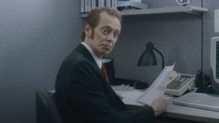 John (Steve Buscemi) has a conversation at work in Saint John of Vegas