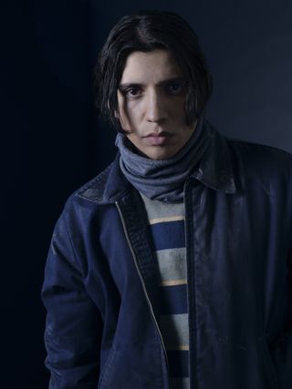 Kevin Alves poses as teen travis in a promotional shot for yellowjackets