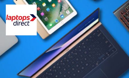 Blue background with Macbook, Ipad and keyboard