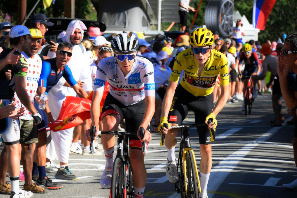 ALPE DHUEZ FRANCE JULY 14 LR Tadej Pogacar of Slovenia and UAE Team Emirates white best young jersey and Jonas Vingegaard Rasmussen of Denmark and Team Jumbo Visma Yellow Leader Jersey compete during the 109th Tour de France 2022 Stage 12 a 1651km stage from Brianon to LAlpe dHuez 1471m TDF2022 WorldTour on July 14 2022 in Alpe dHuez France Photo by Bernard Papon PoolGetty Images