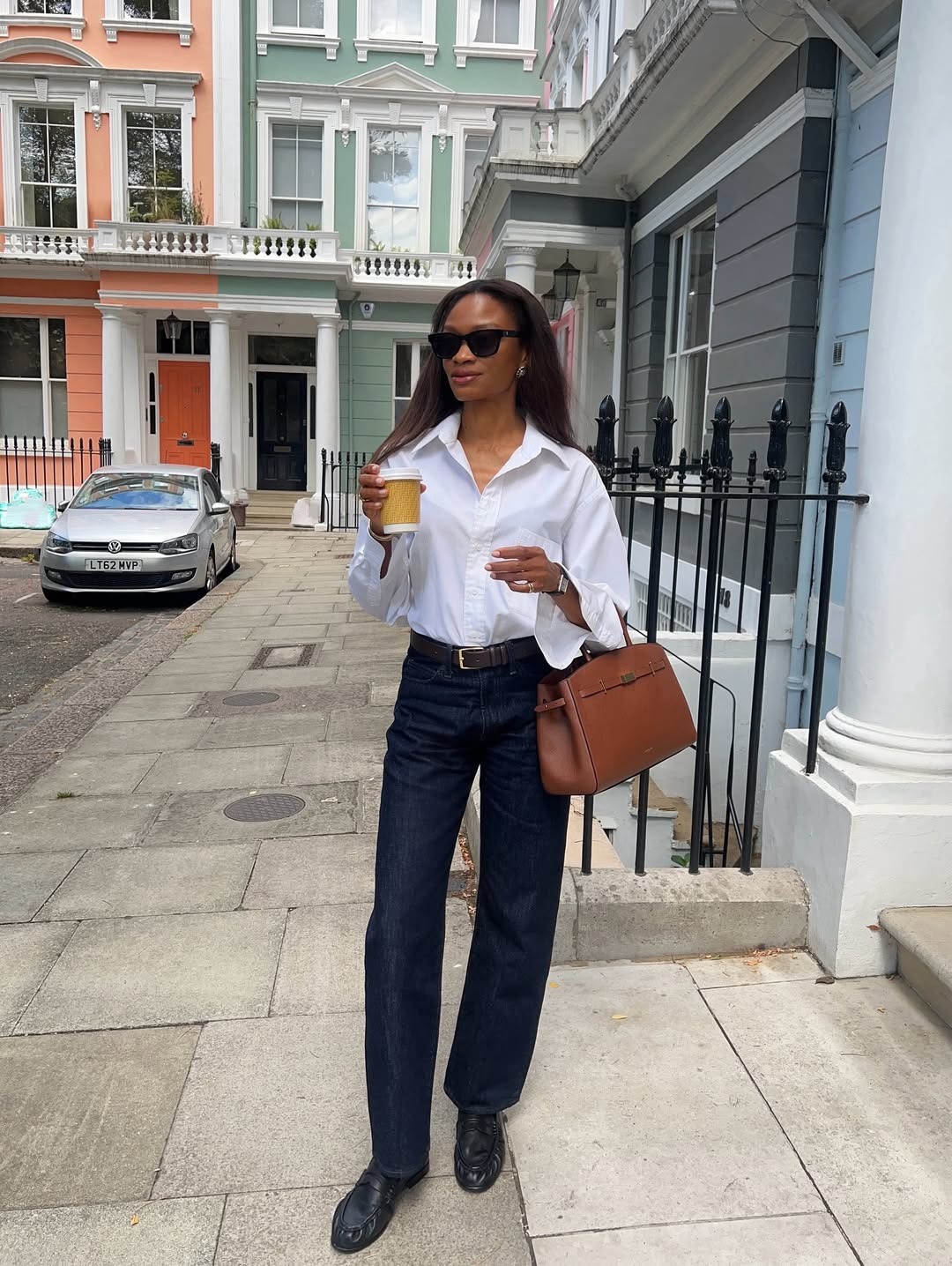 Woman in ruched black loafers