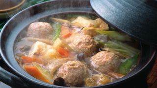 Boiled vegetable and meat ball in pot - stock photo