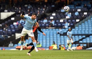Sergio Aguero heads in his 260th Manchester City goal