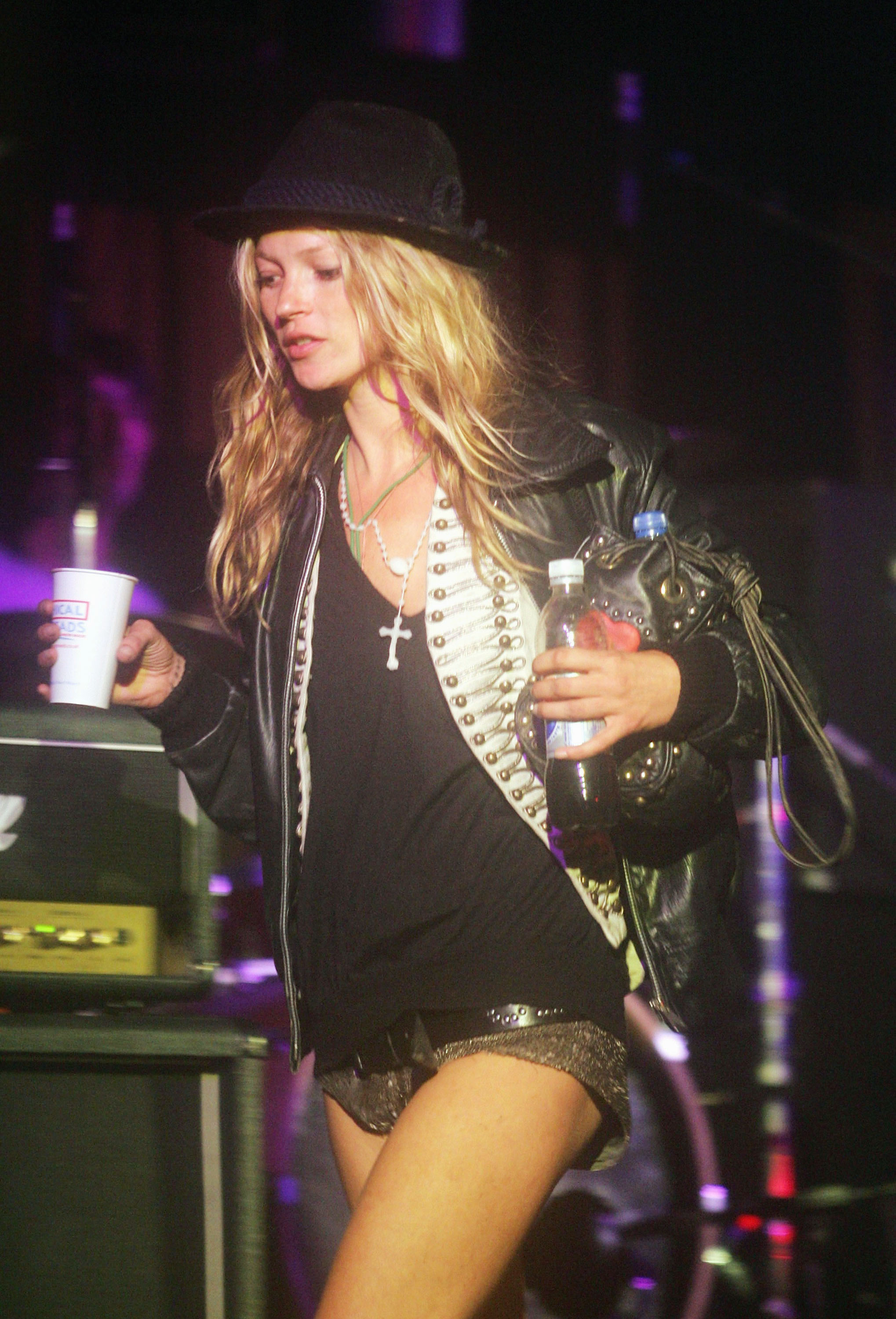 Image of Kate Moss at Glastonbury. She is wearing a Neaoplean jacket one of Tiktoks biggest fashion trends of 2026.