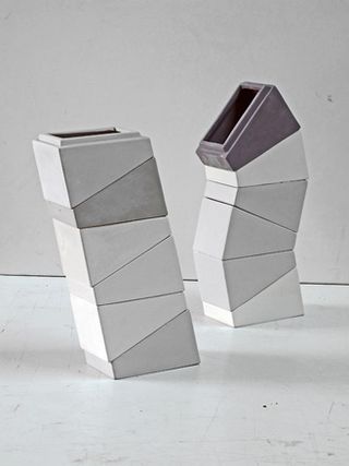 Set of two square leaning ceramic vases