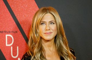 Jennifer Aniston on red carpet for Netflix movie Dumplin'