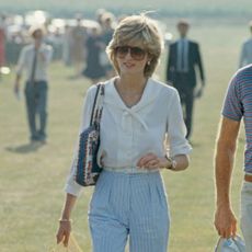 Princess Diana arriving at a polo match at Cowdray Park Polo Club 