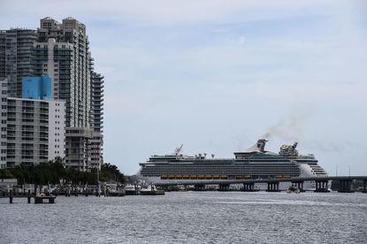 A cruise ship sails by Miami Beach.