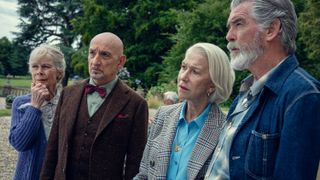 L-R: Celia Imrie, Ben Kingsley, Helen Mirren, and Pierce Brosnan stand side-by-side in a scene from Netflix's "Thursday Murder Club" movie