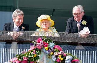 John Warren, Queen Elizabeth II and Lord Samuel Vestey watch the racing as they attend Derby Day during the Investec Derby Festival at Epsom Racecourse on June 3, 2017 in Epsom