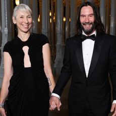 Alexandra Grant in a black gown and Keanu Reeves in a tux at the 2023 LACMA Art+Film Gala on November 4, 2023