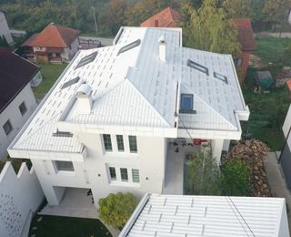 Modern white home aerial view