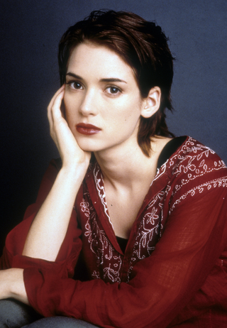 Winona Ryder wears the atmospheric red nail trend in “Reality Bites”