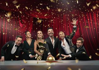 Ant & Dec and Alesha Dixon, Amanda Holden, Simon Cowell, Bruno Tonioli celebrating surrounded by golden confetti