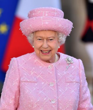 Queen Elizabeth II arrives to attend a meeting with French President Francois Hollande (not seen) at the Elysee Presidential Palace on June 5, 2014 in Paris, France. The Queen and Britain's Prince Philip, Duke of Edinburgh, are in France for a state visit to mark the 70th anniversary of the D-Day landings on Friday, June 06, 2014.