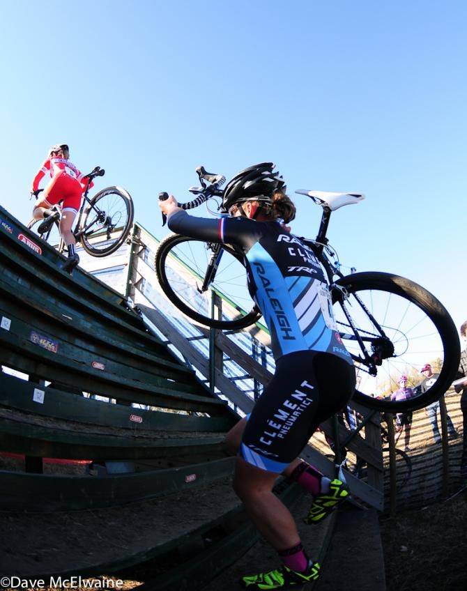 Caroline Mani (Raleigh Clement) on the flyover behind Elle Anderson