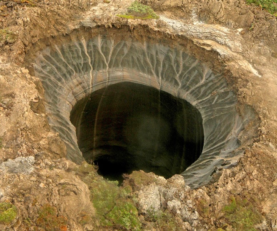 WHY MYSTERIOUS CRATERS APPEAR IN SIBERIAN TUNDRA