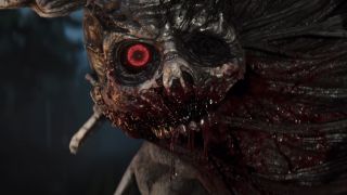 Close-up of gory zombified creature with a glaring red eye in trailer for John Carpenter's Toxic Commando video game