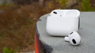 Airpods 3 With Case Right Earbud Lying In Front Of Case