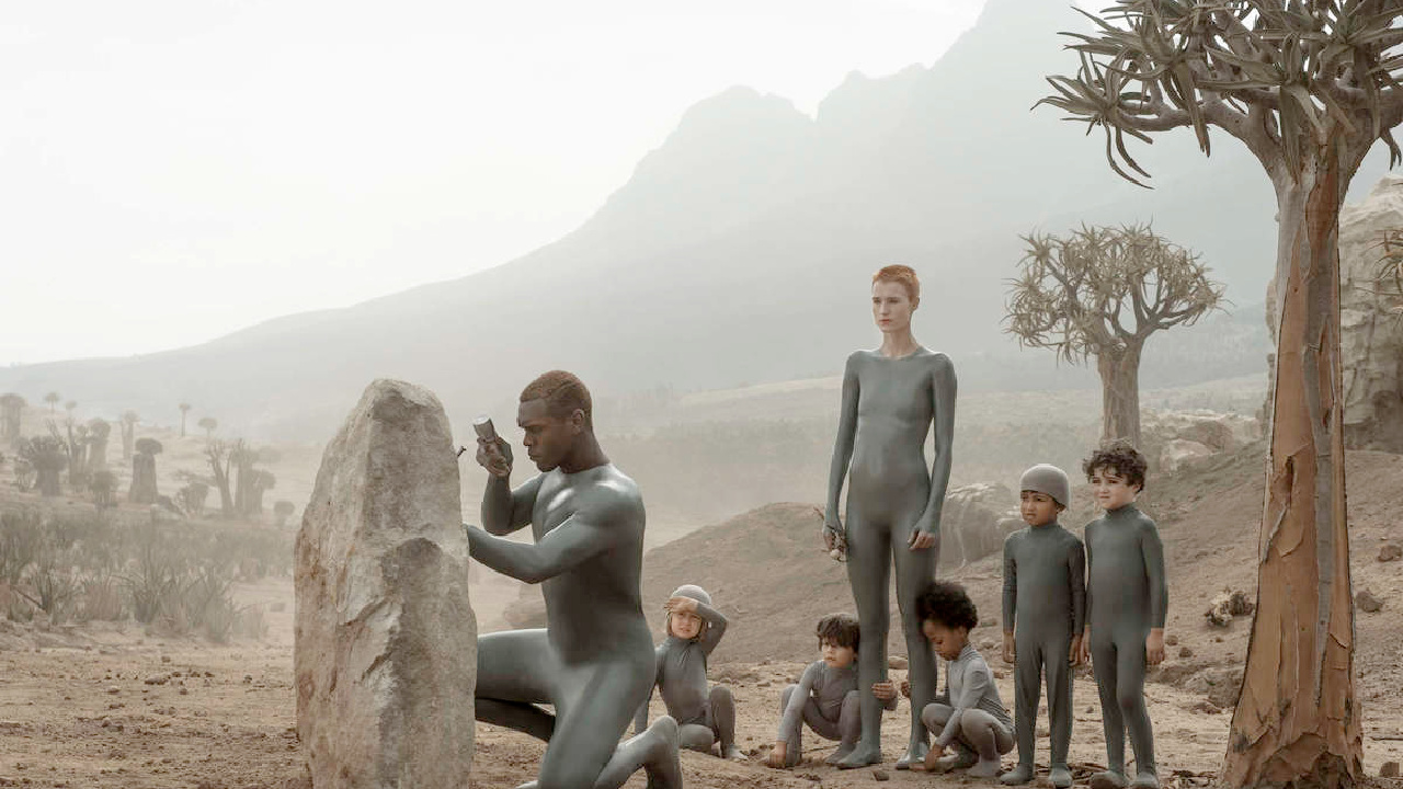 The two androids in Raised By Wolves with a group of children.