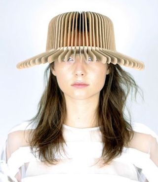 Clothing, Lip, Hairstyle, Shoulder, White, Jaw, Hat, Headgear, Costume accessory, Neck,