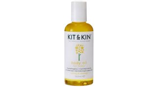 Bottle of Kit & Kin baby oil as part of a baby massage oils roundup