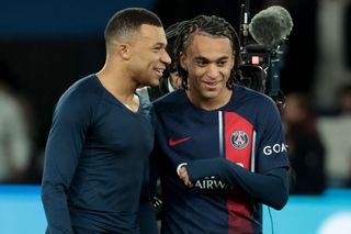 Kylian Mbappe and his brother Ethan Mbappe of PSG celebrate the victory following the Ligue 1 Uber Eats match between Paris Saint-Germain (PSG) and FC Metz (FCM) at Parc des Princes stadium on December 20, 2023 in Paris, France.