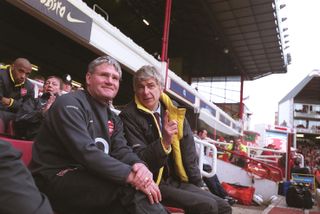 Arsenal manager Arsene Wenger and assistant manager Pat Rice on the bench during a Premier League match against Aston Villa, 2006