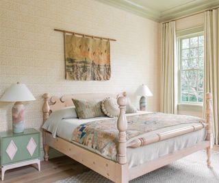 Cream colored bedroom with double bed