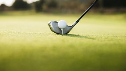 golf club on green for PGA tax status story