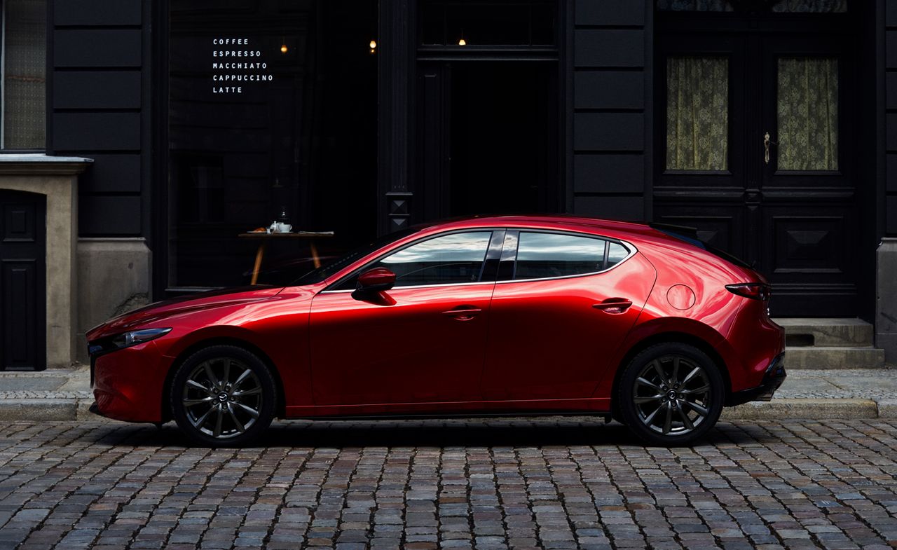 Lifestyle view of the new Mazda 3 compact saloon and hatchback